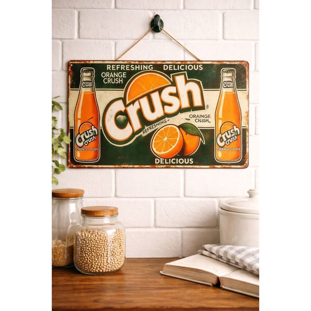 Classic vintage-inspired Orange Crush metal wall sign featuring retro soda bottl